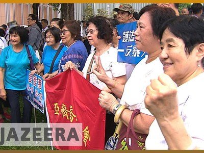 Thousands of supporters of pro-China groups have held a rally in Hong Kong