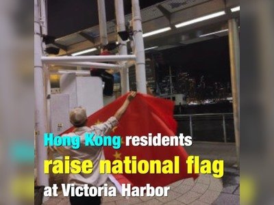 Several Hong Kong residents gathered in Harbor City on August 4, 2019, to hold a national flag raising ceremony.