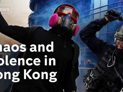 Hong Kong protesters throw bricks and petrol bombs at riot police