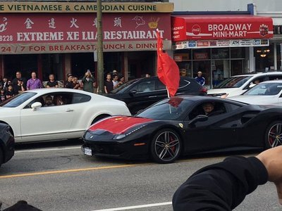 Convoys of Ferrari-driving pro-China patriots rev up protests in Vancouver and Toronto
