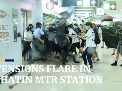 Protesters attack police at Sha Tin station, after day of protests in Hong Kong