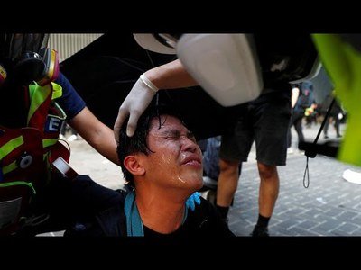 Anti-China protesters face off with Hong Kong riot police