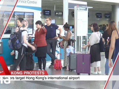 Passengers heading to Hong Kong airport stranded as Airport Express is suspended