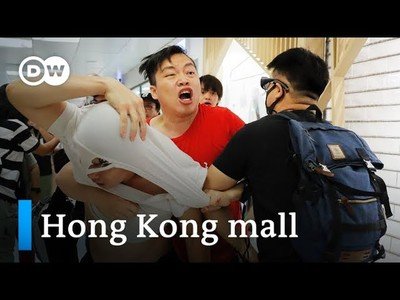 Hong Kong pro-democracy and pro-Beijing protesters clash at mall