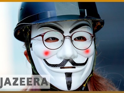 Hong Kong protesters rally against ban on wearing masks