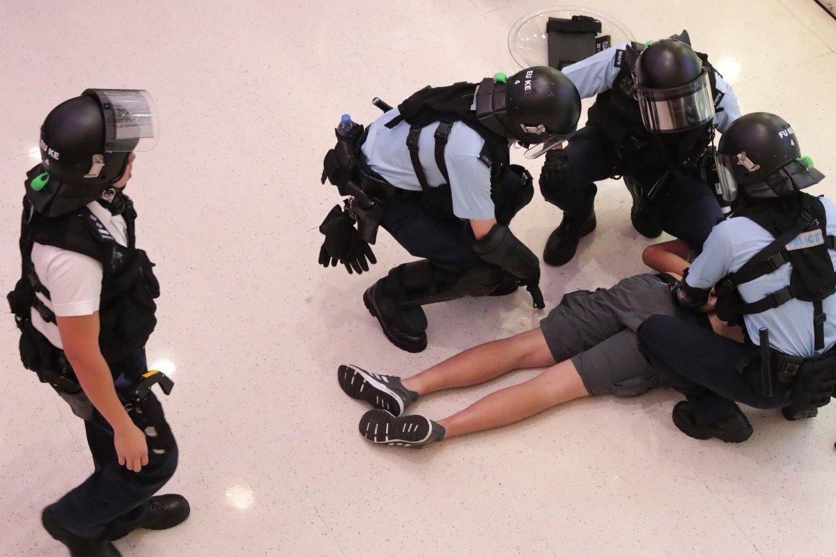Police treatment of children arrested at Hong Kong protests raises concern