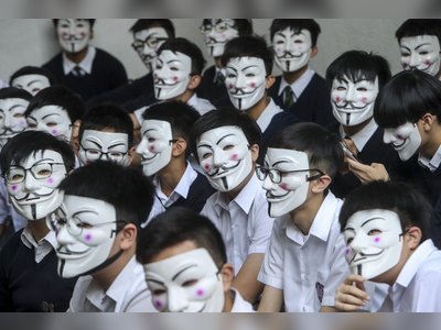 Hong Kong pupils cover faces in citywide protests marking one month since mask ban introduced