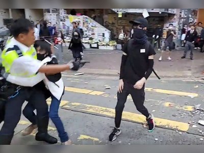 Student shot and man set ablaze in one of the most violent days of Hong Kong anti-government unrest yet