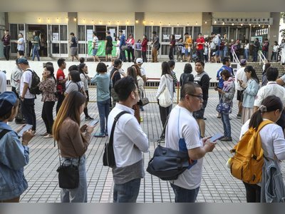 Hong Kong district council polls: record turnout includes those who returned from overseas and immigrants voting for the first time