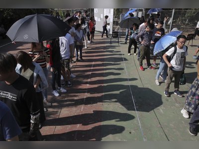 No protests, no violence, no tear gas: not your usual Sunday in Hong Kong, as voters join peaceful, snaking queues