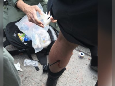 HK officer hit by arrow; activists vow to ‘squeeze economy’