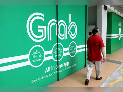 Grab says it will apply for Singapore digital bank license with Singtel