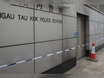 Hong Kong police station damaged by suspected petrol bomb attack on Sunday morning