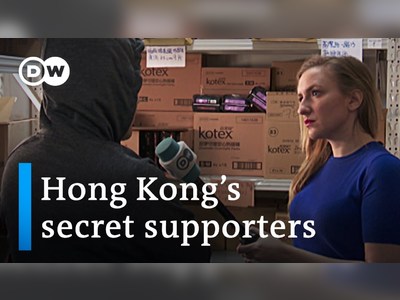 How Hong Kong’s frontline protesters are backed by anonymous supporters | DW News