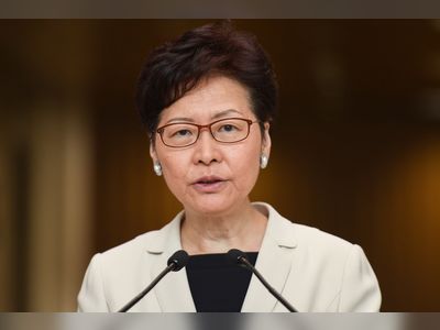 Hong Kong leader Carrie Lam says she's 'very disappointed' by rating downgrade