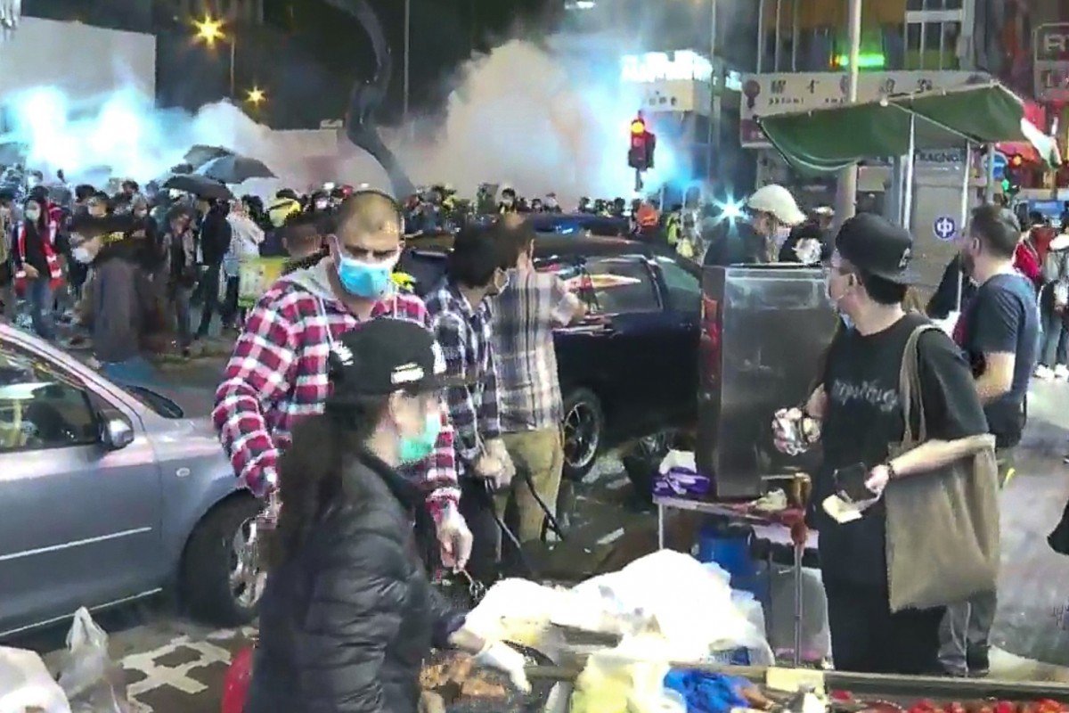 Hong Kong protests: tear gas fired on first day of Lunar New Year as crowd gathers to mark fourth anniversary of Mong Kok riot