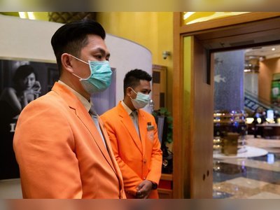 Coronavirus: Macau casinos reopen for masked punters after two-week virus suspension
