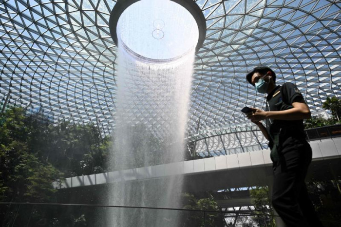 Singapore charges visitors for coronavirus treatment