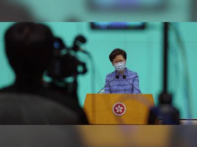 Hong Kong leader dismisses concerns of Chinese power grab