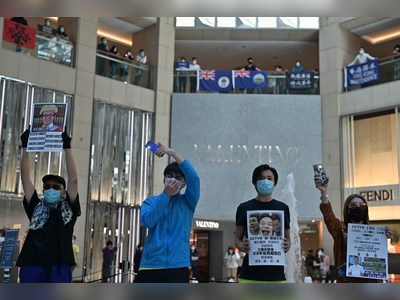 As virus retreats, HK protesters return