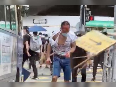 Hong Kong lawyer attacked by black-clad mob near protests against proposed national security law