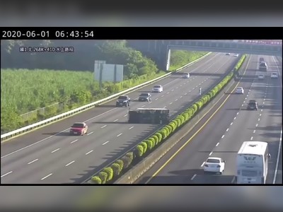 Tesla Model 3 crashes into overturned truck on highway