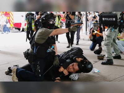 Hong Kong: Police make first arrests under controversial new security law