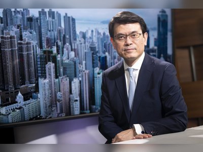 Hong Kong still walking an economic tightrope, commerce minister warns