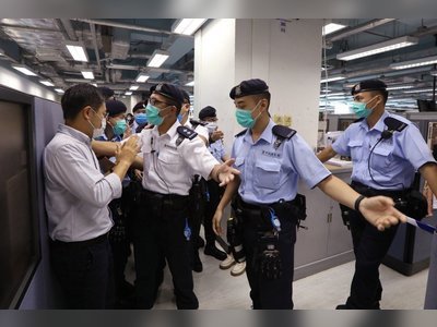 As Hong Kong police raid Apple Daily offices, publication’s live feed allows world to watch drama unfold