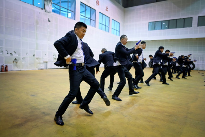 China's rich seek bodyguards schooled in digital dark arts