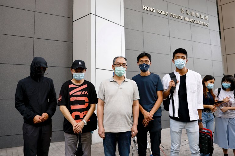 Hong Kong legislators protest against China’s arrest of activists
