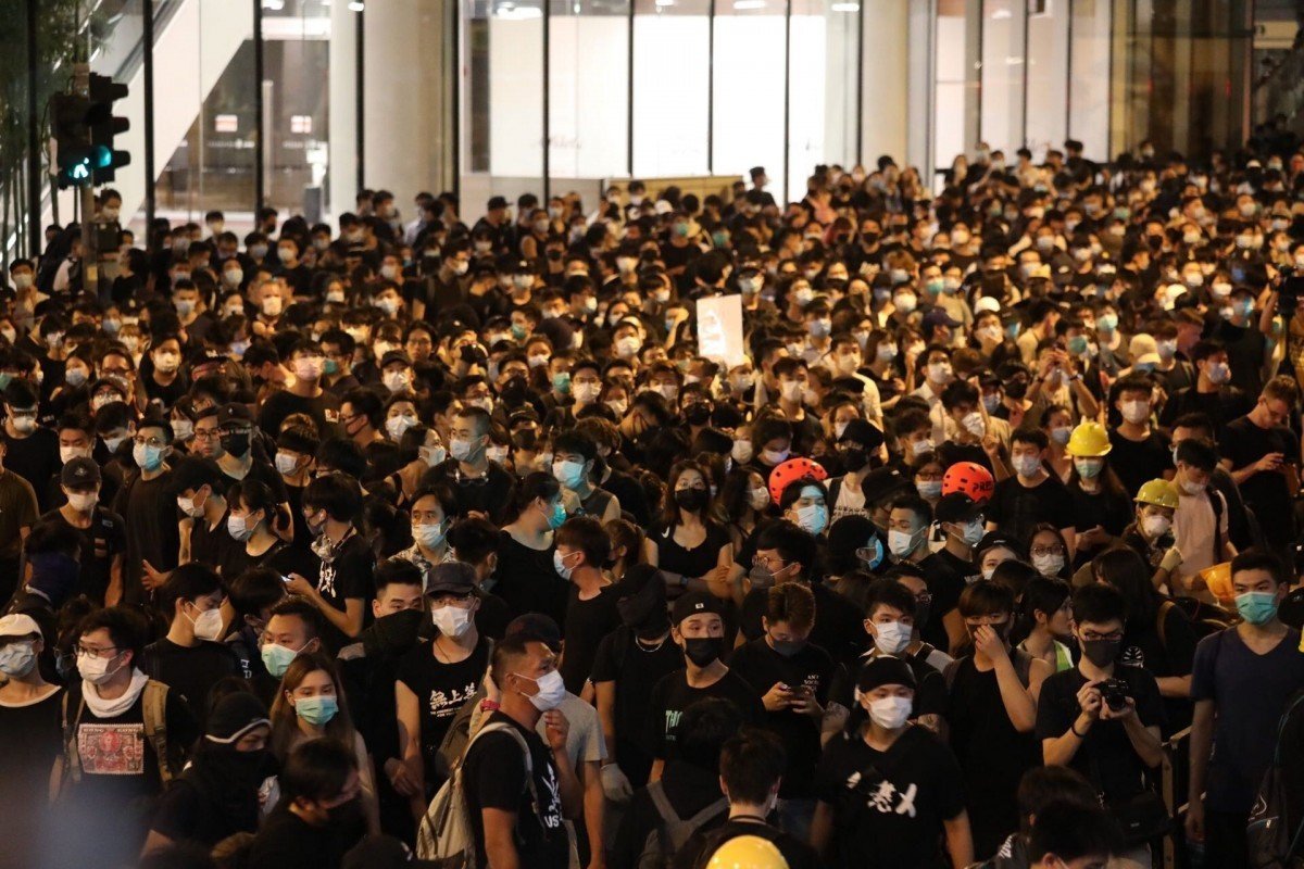 Rioter who attacked officer during Hong Kong police HQ siege gets four years