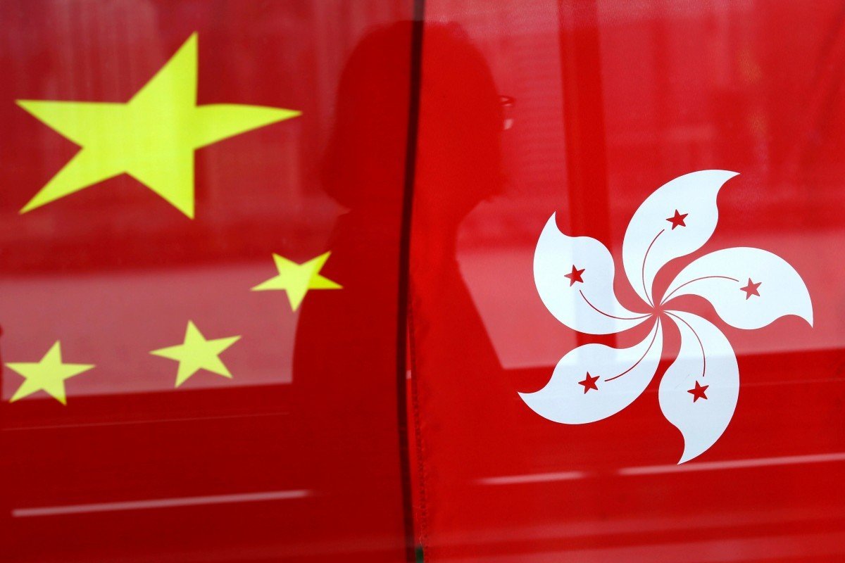 Hong Kong, Macau residents spared trips home under mainland China permit plan