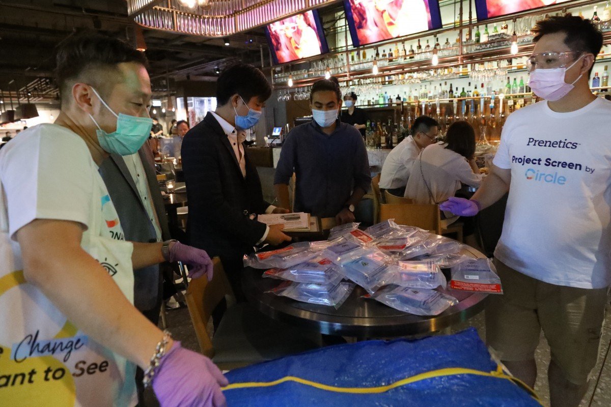 Hong Kong company hands out free coronavirus test kits to bar-goers