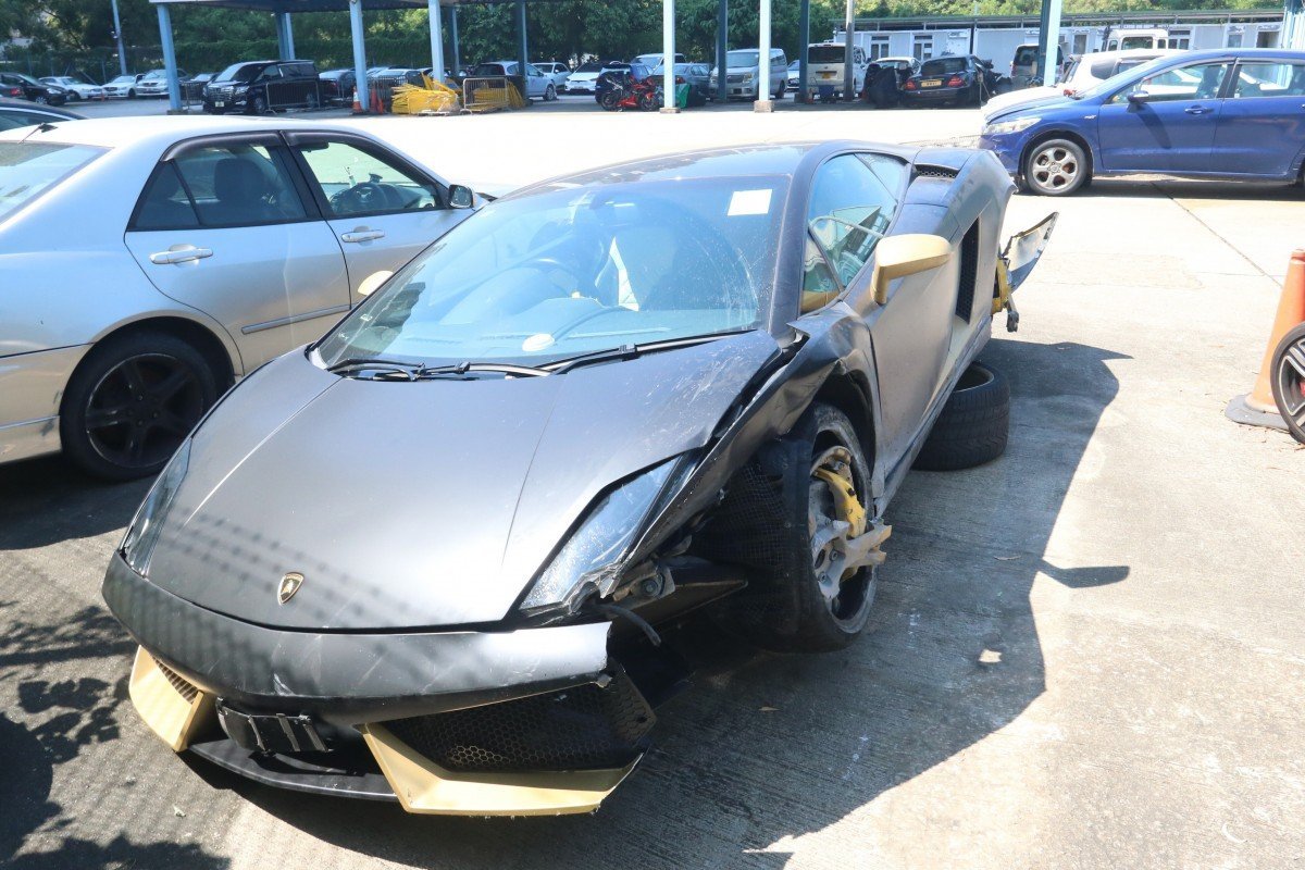 Pair arrested after HK$3.7 million Lamborghini slams into side of Hong Kong flyover