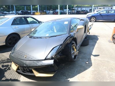 Pair arrested after HK$3.7 million Lamborghini slams into side of Hong Kong flyover