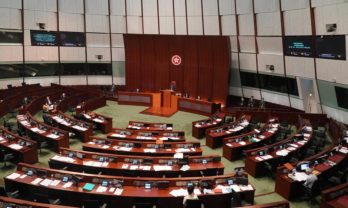 Hong Kong court adjourns case of ex-lawmakers disturbing LegCo order