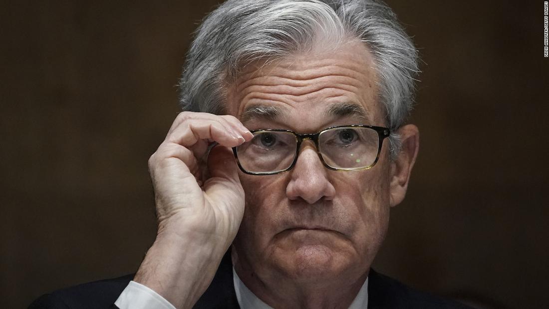 Fed keeps interest rates near zero and warns of further pandemic strain on the economy