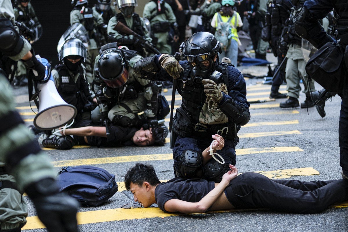 Hong Kong police suspending alternative identification system after court ruling
