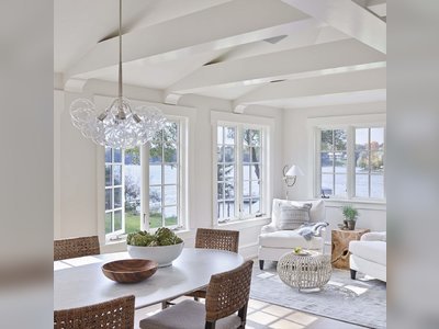 How One Designer Used White Paint to Transform a Once-Kitschy Lake House