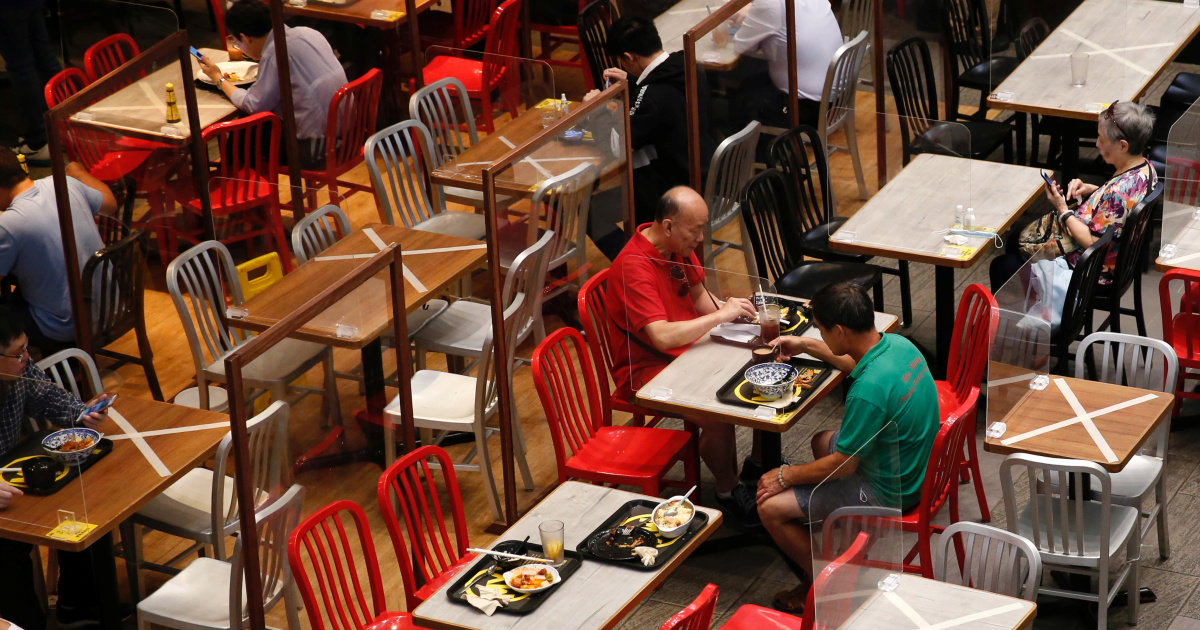 Social-distancing marks are seen at a restaurant following the coronavirus disease outbreak in Hong Kong on July 27, 2020 [File: Tyrone Siu/ Reuters]