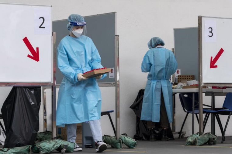 Hong Kong will have enough Covid-19 vaccines but it still needs to be vigilant: Senior officials