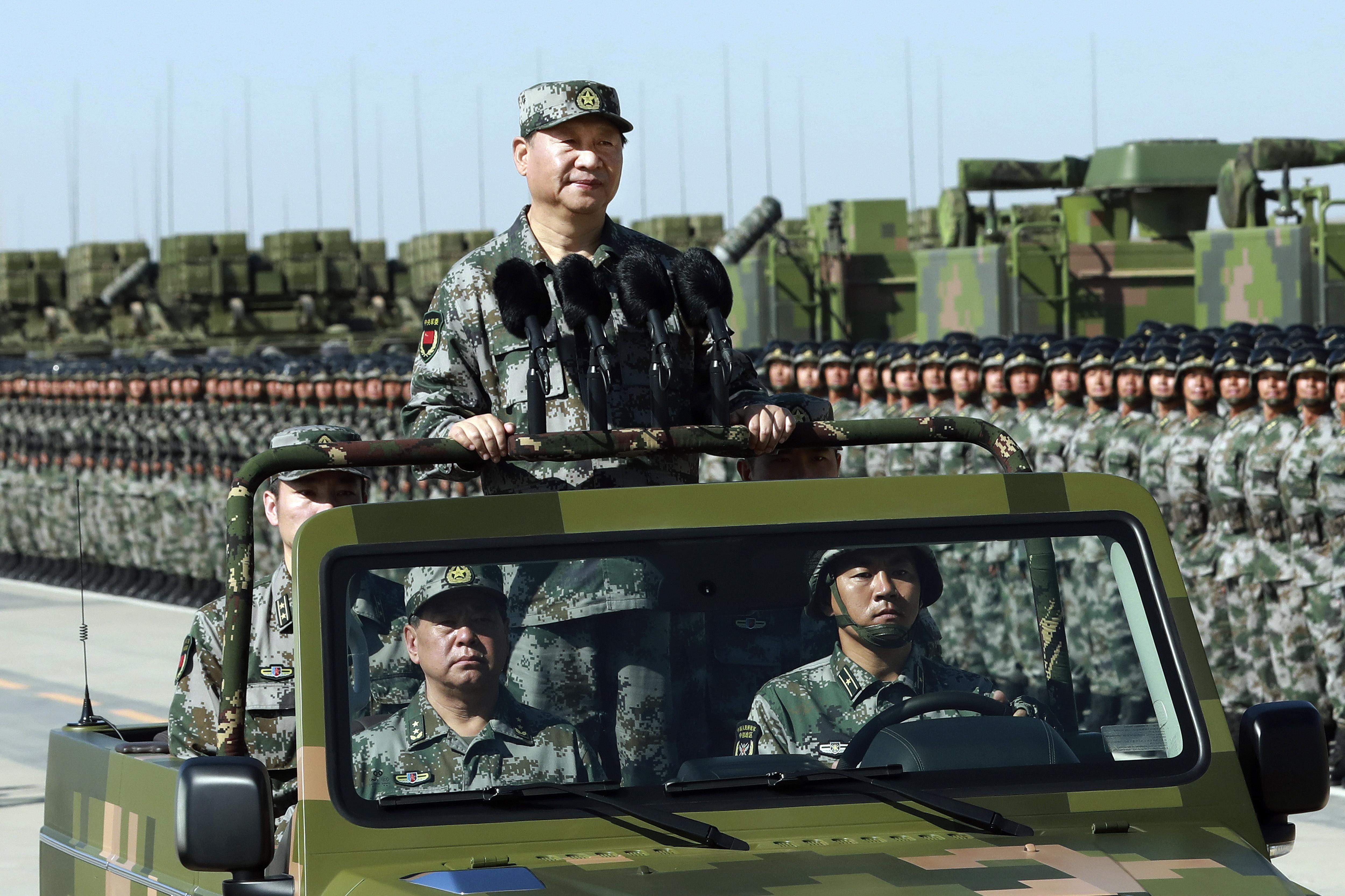 China military expanding, has global ambitions: Congressional report