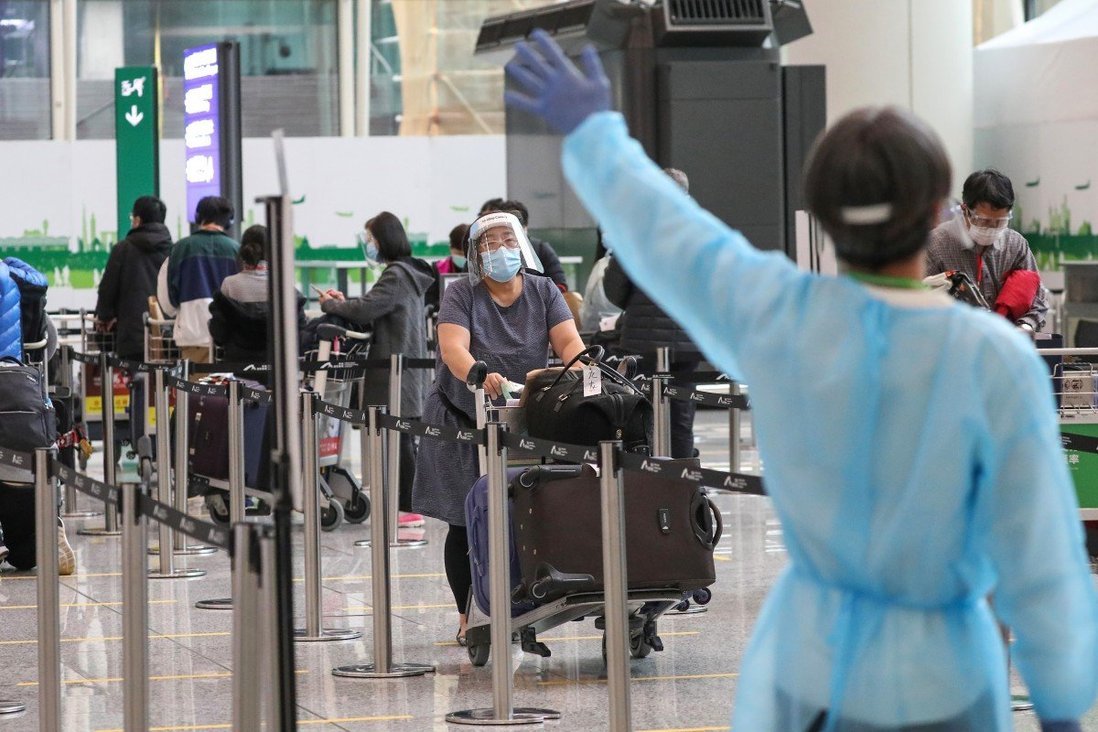 Hong Kong airport Covid-19 test time halved, closing flight ban loophole