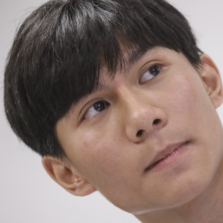 Hong Kong university student leader arrested during early morning house raid