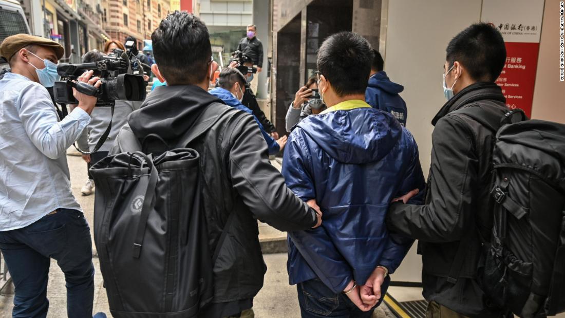 Dozens of Hong Kong opposition figures arrested under national security law