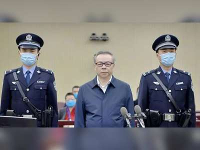 China executes ex-banker in bribes, bigamy case