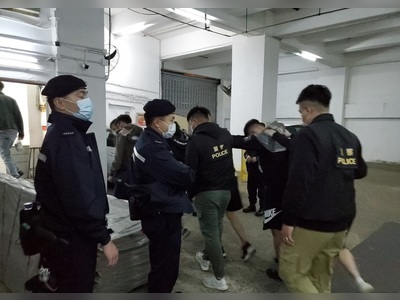 Police arrest 19 people during raid on illegal gambling den and unlicensed bar