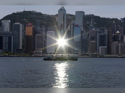 Hong Kong can emerge from recession this year, financial chief predicts