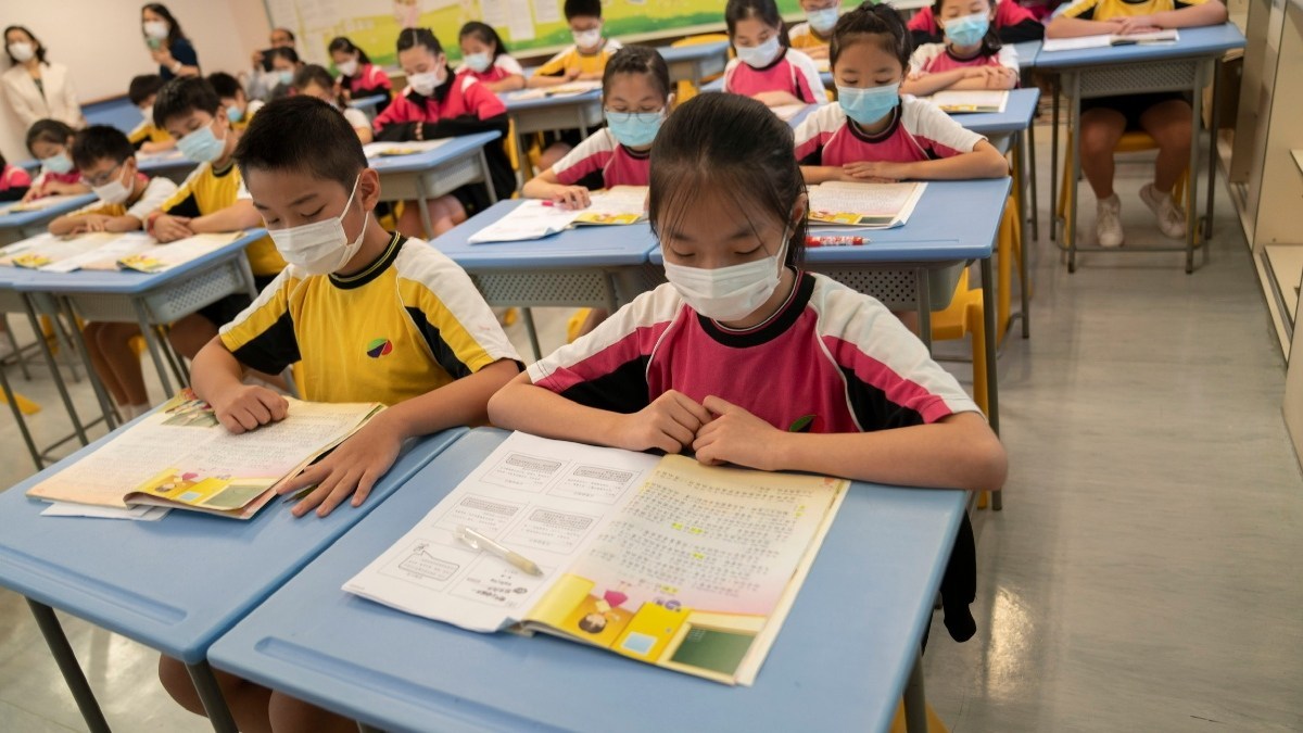 Hong Kong to ease limits on classroom numbers